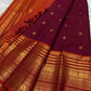 Deep maroon handwoven pure silk Kanchipuram saree with Varisaipet Mayil Butta and rust orange border — Idam Living