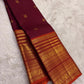 Close view of Varisaipet body showing Mayil Butta in gold zari on deep maroon silk