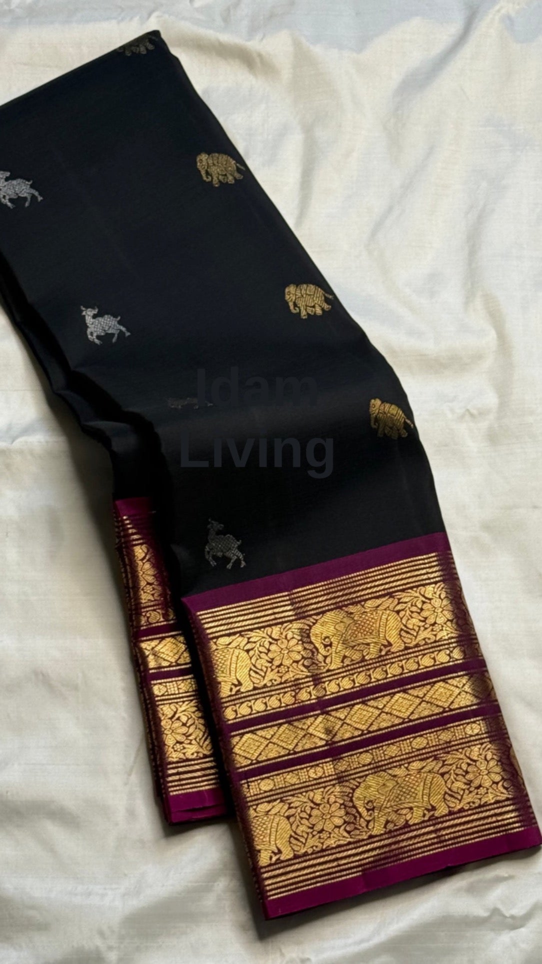 Deep Midnight Black Kanchi Pattu Saree — body close-up showing scattered gold zari buttas