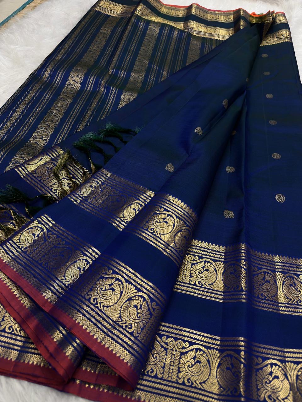 Deep Navy Blue Handwoven Pure Silk Kanchipuram Saree with Rettapet Mayil Zari Border and Orange-Red Selvedge