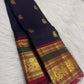 Close-up of elephant zari buttas on the deep navy Kanchi Pattu silk saree.