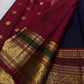 Handwoven deep navy Kanchi Pattu saree, full drape with elephant motifs.