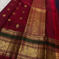 Elephant motif and geometric zari detail on the deep navy Kanchi Pattu saree border.