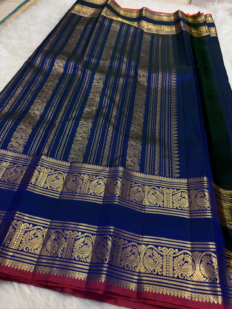 Deep Navy Blue Handwoven Pure Silk Kanchipuram Saree with Rettapet Mayil Zari Border and Orange-Red Selvedge