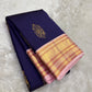Deep navy Pure Silk Kanjeevaram saree with lotus-pink border.