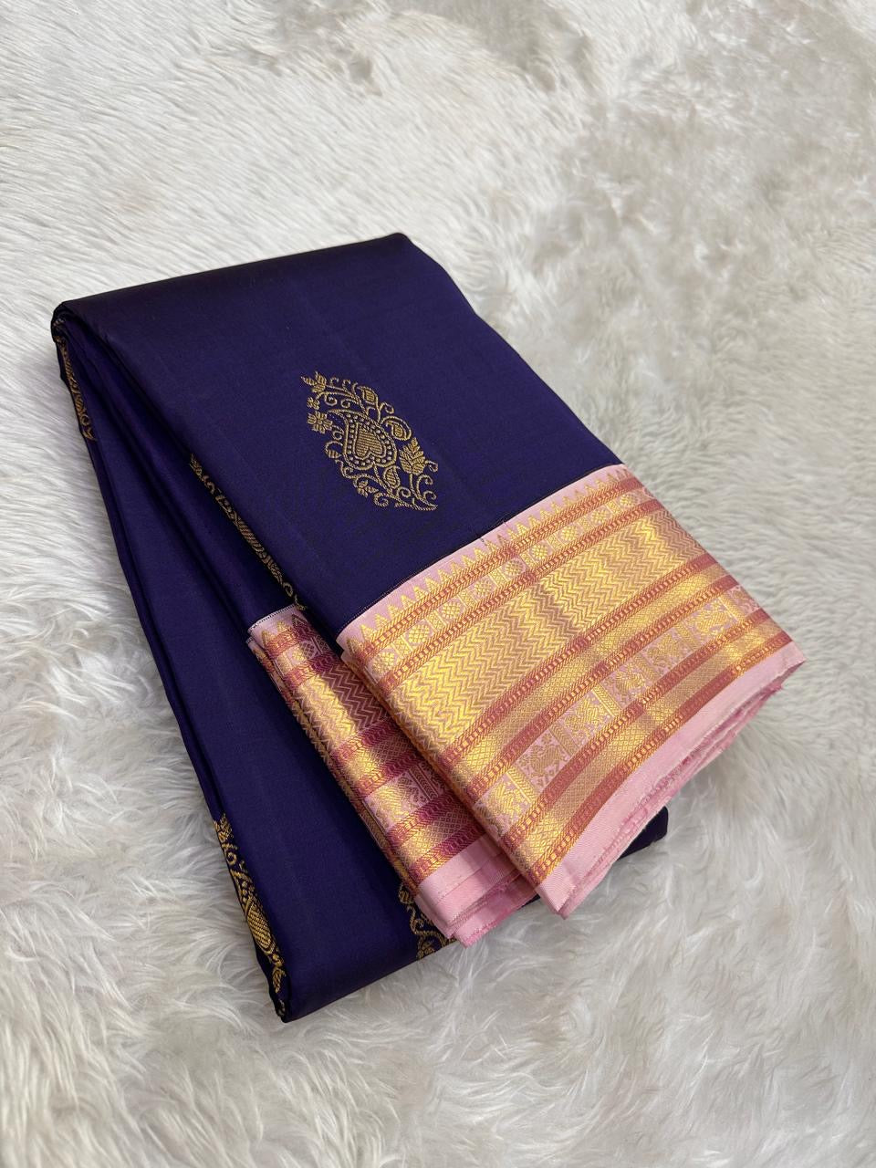 Deep navy Pure Silk Kanjeevaram saree with lotus-pink border.