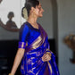 Deep Neelam pure silk Kanchipuram Zari Kattam saree with broad Yaanai classic gold zari border.