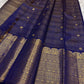 Floral classic-gold zari forms across the broad traditional Kanchipuram border.