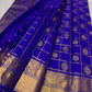 Deep Neelam Kanchipuram mundhanai densely woven with geometric gold zari and ornamental motif bands.