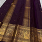 Deep Paaku Brown-Maroon Pure Silk Kanchipuram saree with delicate classic-gold zari buttas.