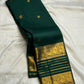 Deep forest green handwoven pure silk Varisaipet saree by Idam Living.