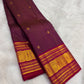 Sorgavasal peacock medallion close-up on deep plum Kanchipuram pure silk saree — Idam Living
