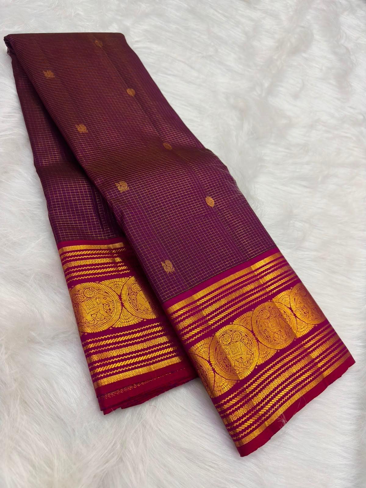 Sorgavasal peacock medallion close-up on deep plum Kanchipuram pure silk saree — Idam Living