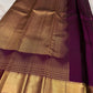 Handwoven Plum Purple Kanchipuram silk saree with rows of petite gold zari motifs