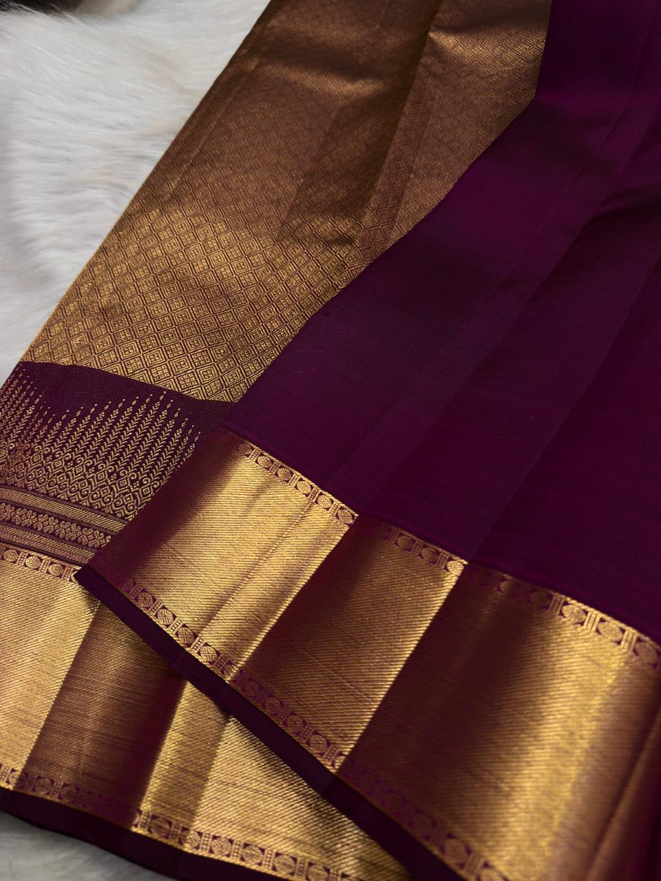Pure Silk Kanchipuram Butta saree with broad antique gold zari border