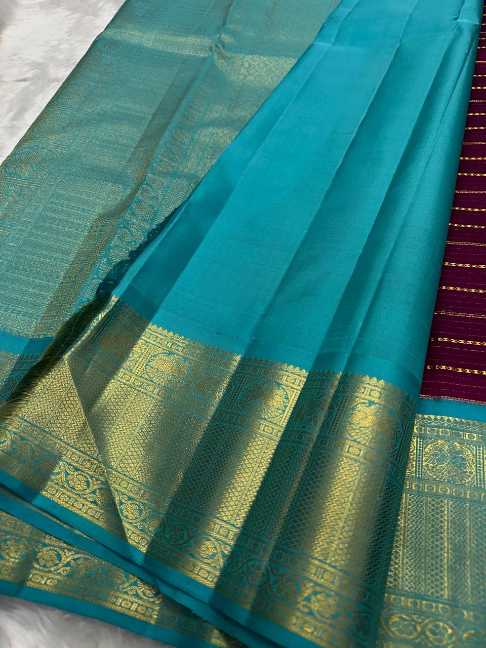 Deep Plum Handwoven Pure Silk Kancheepuram Korvai Saree with Turquoise Zari Border and Veldhari Lines