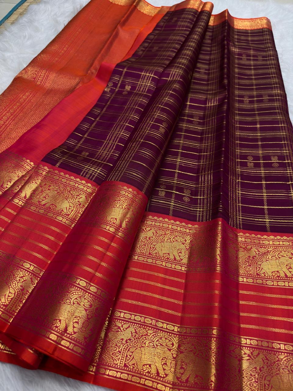 Deep Plum Handwoven Pure Silk Kanchipuram Zari Kattam Saree with Vermilion Elephant Zari Border – silk body weave close-up