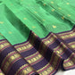 Emerald Green and Deep Purple handwoven pure silk Kanchipuram saree.