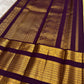 Deep purple Kai Korvai border of lime chartreuse Kanjipuram saree with dense Yaanai Maanga and geometric antique gold zari array