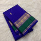 Vivid Neelam Blue and Emerald Green pure silk Kanchipuram Varisaipet saree, jewel-toned silk colour in detail.