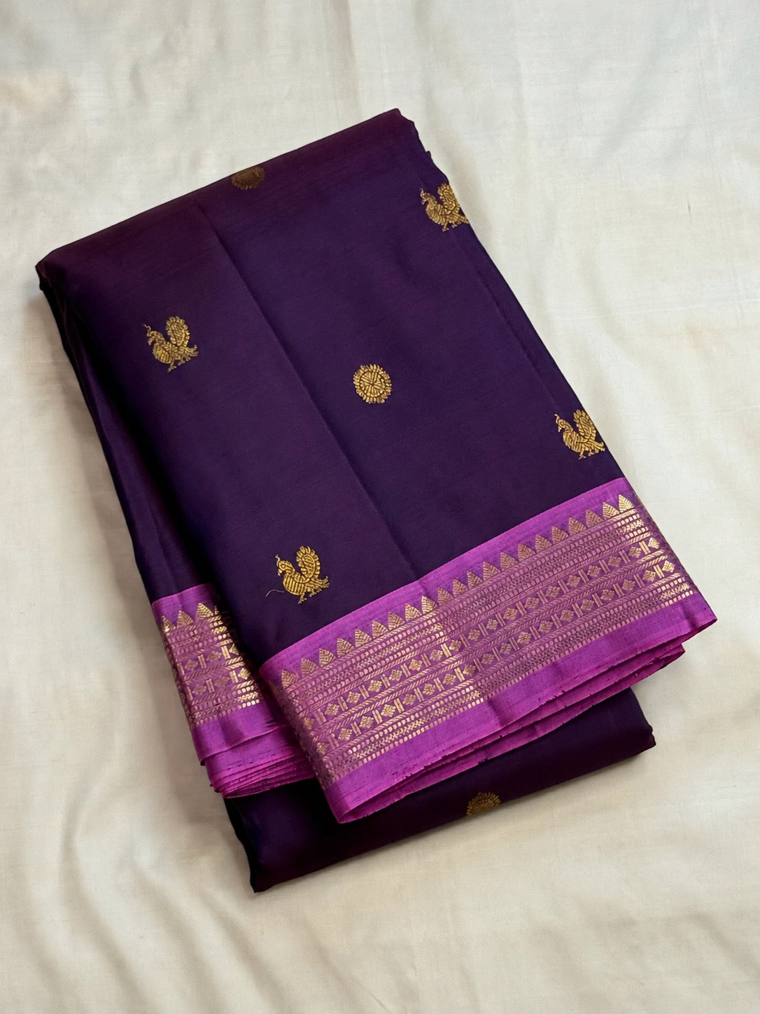 Deep purple Kanchipuram pure silk with petite gold zari buttas