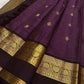 Deep purple Kanchipuram saree showing the Rettapet border and gold-zari registers.