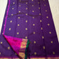 Magenta korvai border with gold zari vanasringaram motifs on deep purple Kanchipuram saree — Idam Living