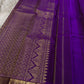 Full pallu spread in purple with gold zari woven grid pattern and a decorative motif panel beside the border, shipped from New Jersey USA.