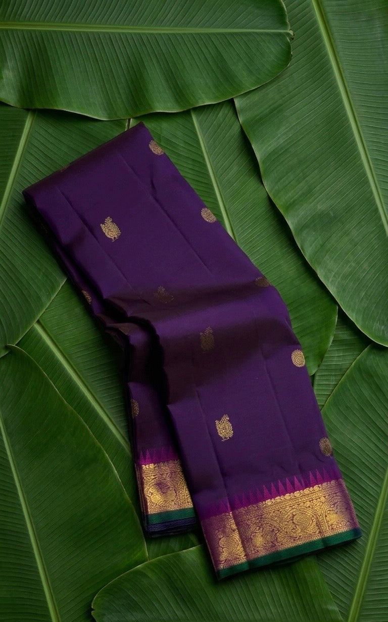 Deep purple handwoven Kanjivaram pure silk saree with mayil butta in gold zari and magenta korvai border — Idam Living