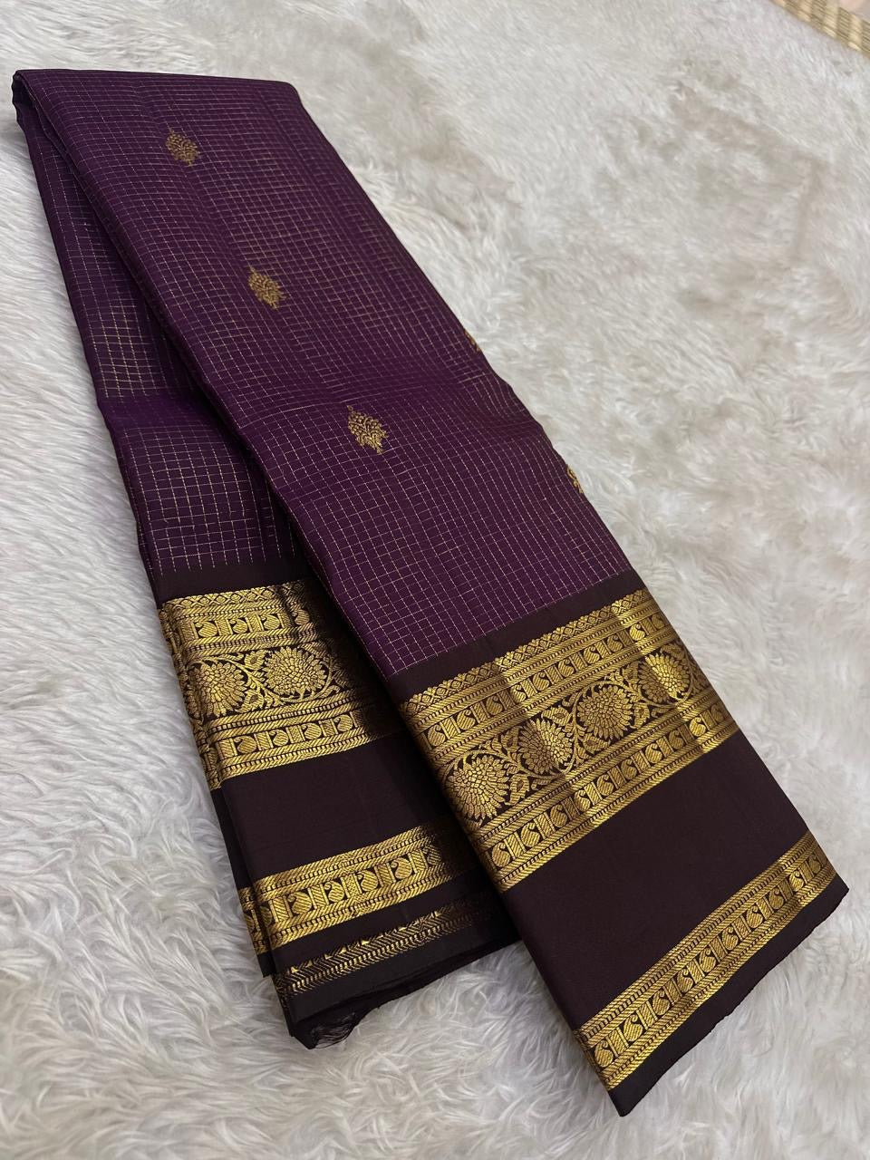 Deep purple handwoven Kanjeevaram Zari Kattam saree with a dark traditional Rettapet border.
