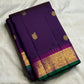 Close-up of mayil butta in gold zari on deep purple Kanjivaram silk saree — Idam Living