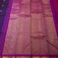 Full view of deep purple Kanjivaram silk saree with mayil butta and magenta korvai border — Idam Living