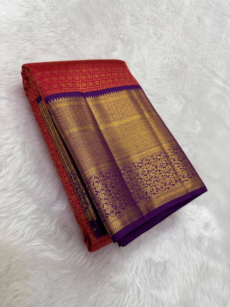 Deep Purple Korvai border densely woven with traditional gold zari.