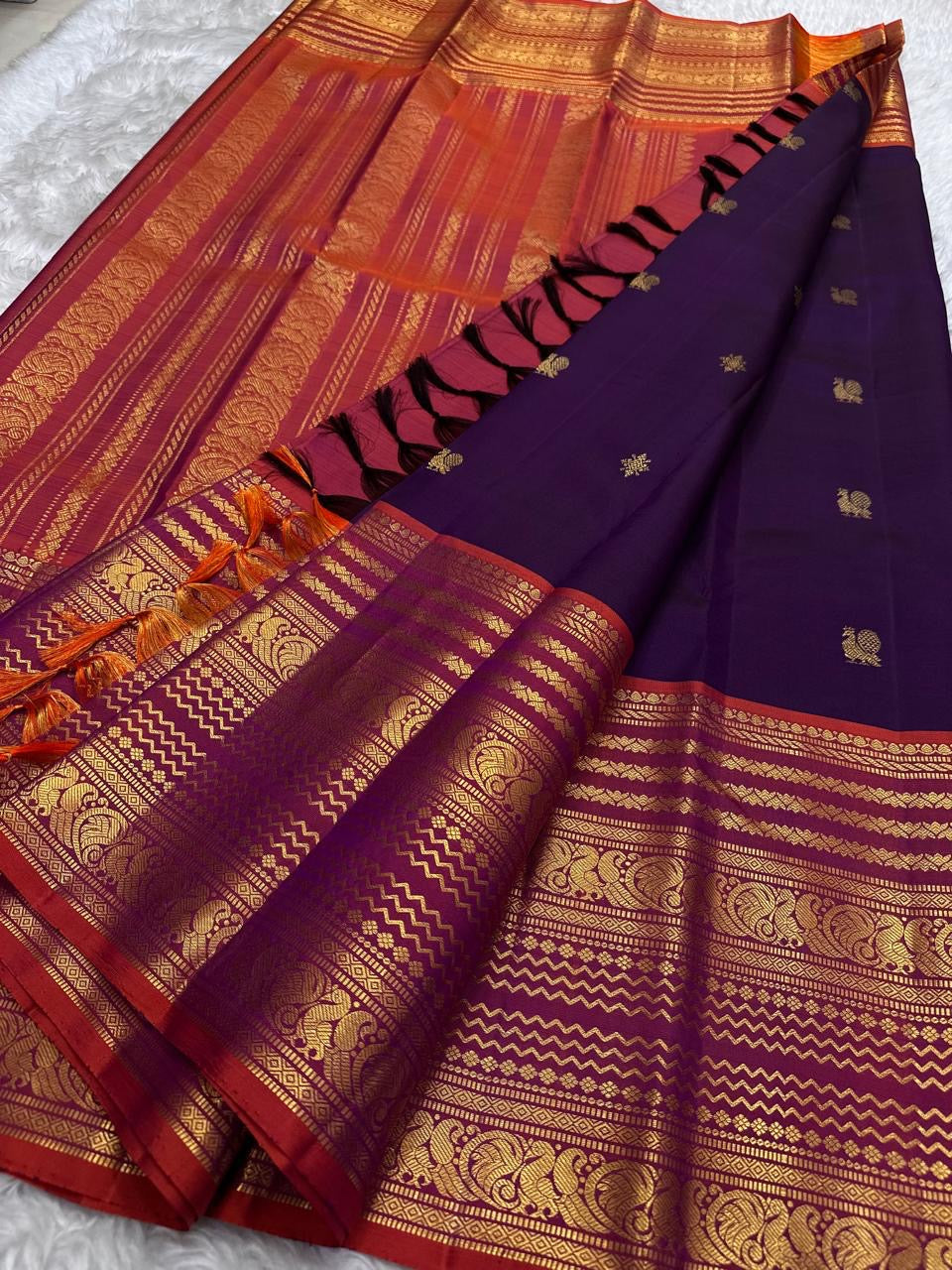 Deep purple handwoven pure silk Kanchi Pattu saree with Varisaipet Mayil Butta and rust orange silk thread border — Idam Living