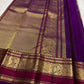Close view of repeating Mayil gold zari motifs on Deep Purple Varisaipet Kanchipuram border.