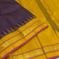 Deep Purple Zari Kattam Kanchipuram saree folded showing the Turmeric Yellow contrast border