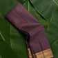Deep purple Zari Kattam Kanchipuram silk saree rolled showing all-over gold zari check body and Maanga Mayil border — Idam Living