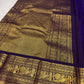 Deep purple Kanjipuram saree with peacock zari pallu