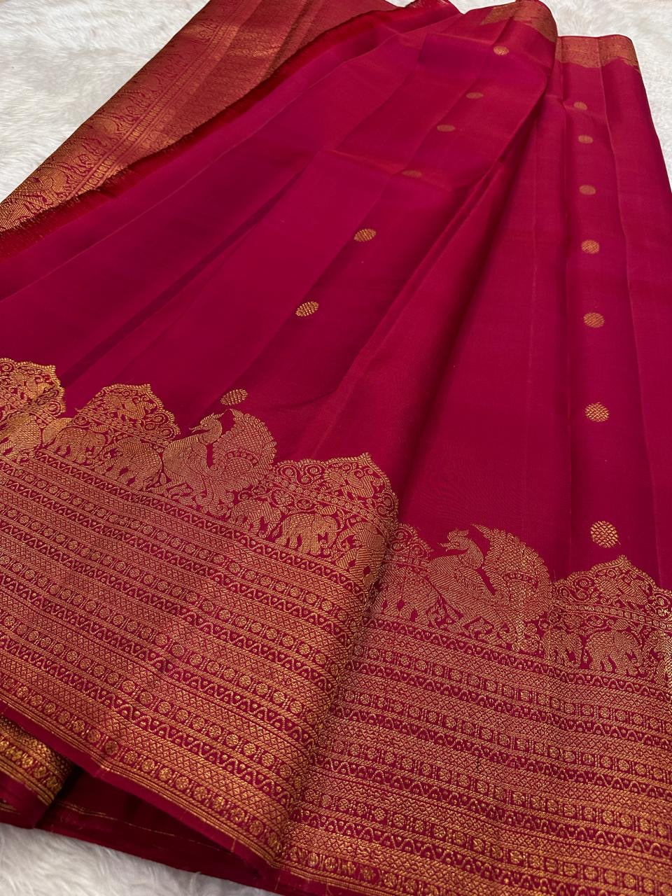 Pallu detail with Gaja-Yali motifs on Deep Rani Pink Kanchipuram silk saree