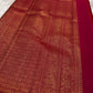 Deep Rani Pink Kanchipuram silk saree body close-up with gold zari floral butta motifs