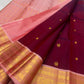 Deep raspberry maroon KanchiPattu saree, Mayil and Chakram butta detail