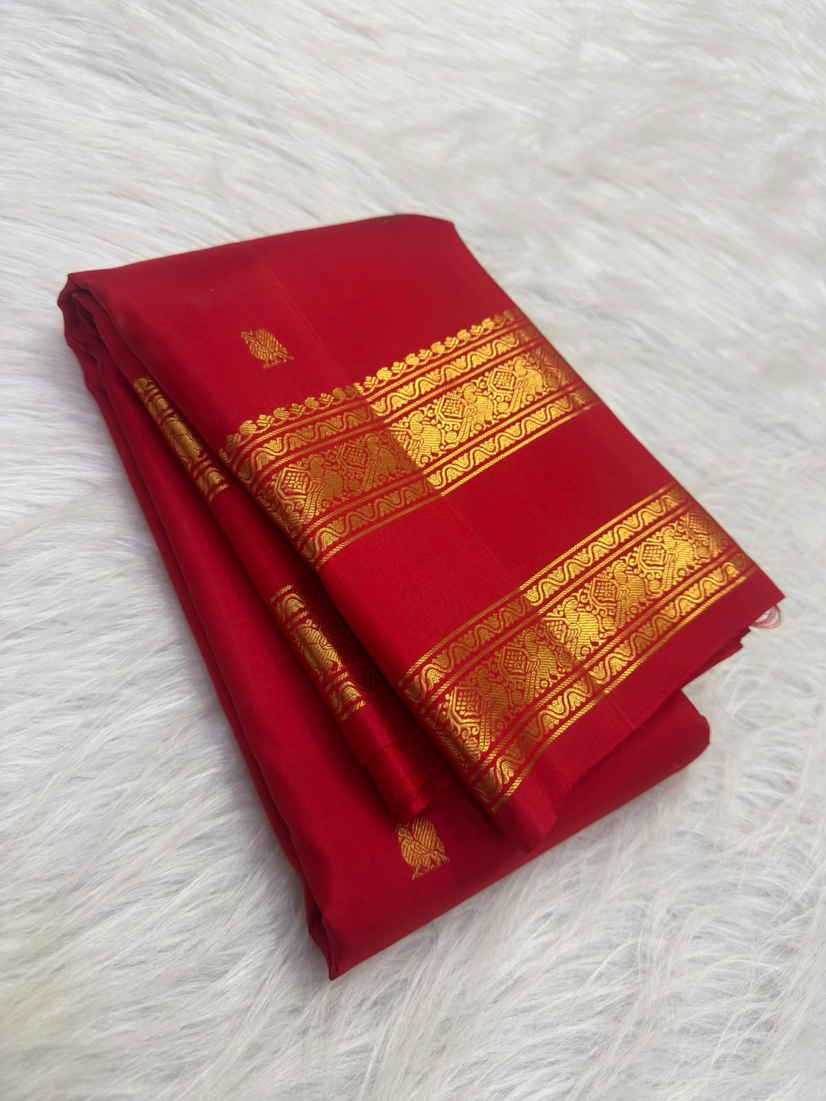 Deep raspberry pink Kanchipuram silk saree with Rettapet border, full view
