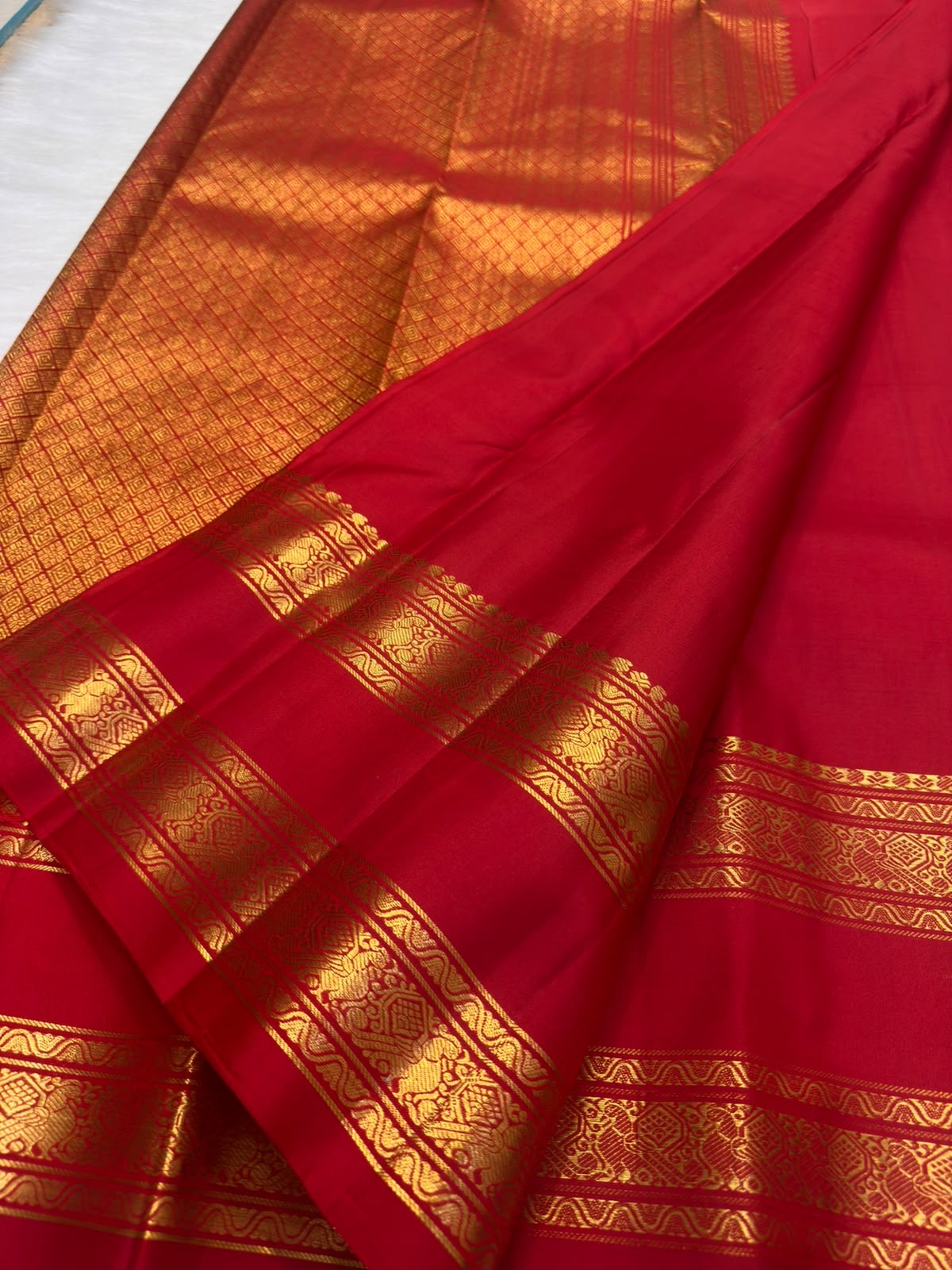 Deep raspberry pink pure silk Kanjipuram Rettapet saree, draped front view