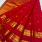 Deep raspberry pink Rettapet saree with gold zari buttas, close-up