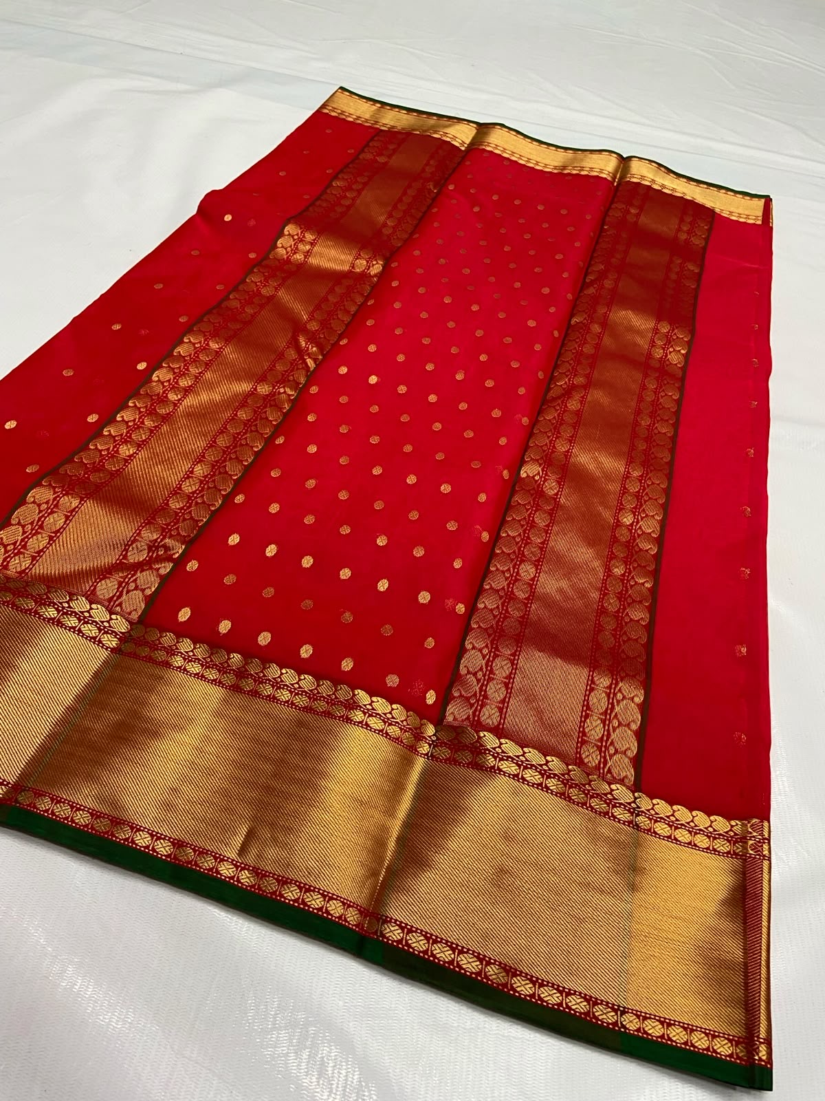 Red Chanderi saree with small gold zari buttas