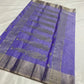Amethyst lavender Chanderi saree opened to show the elongated silver-toned paisley motifs on the pallu