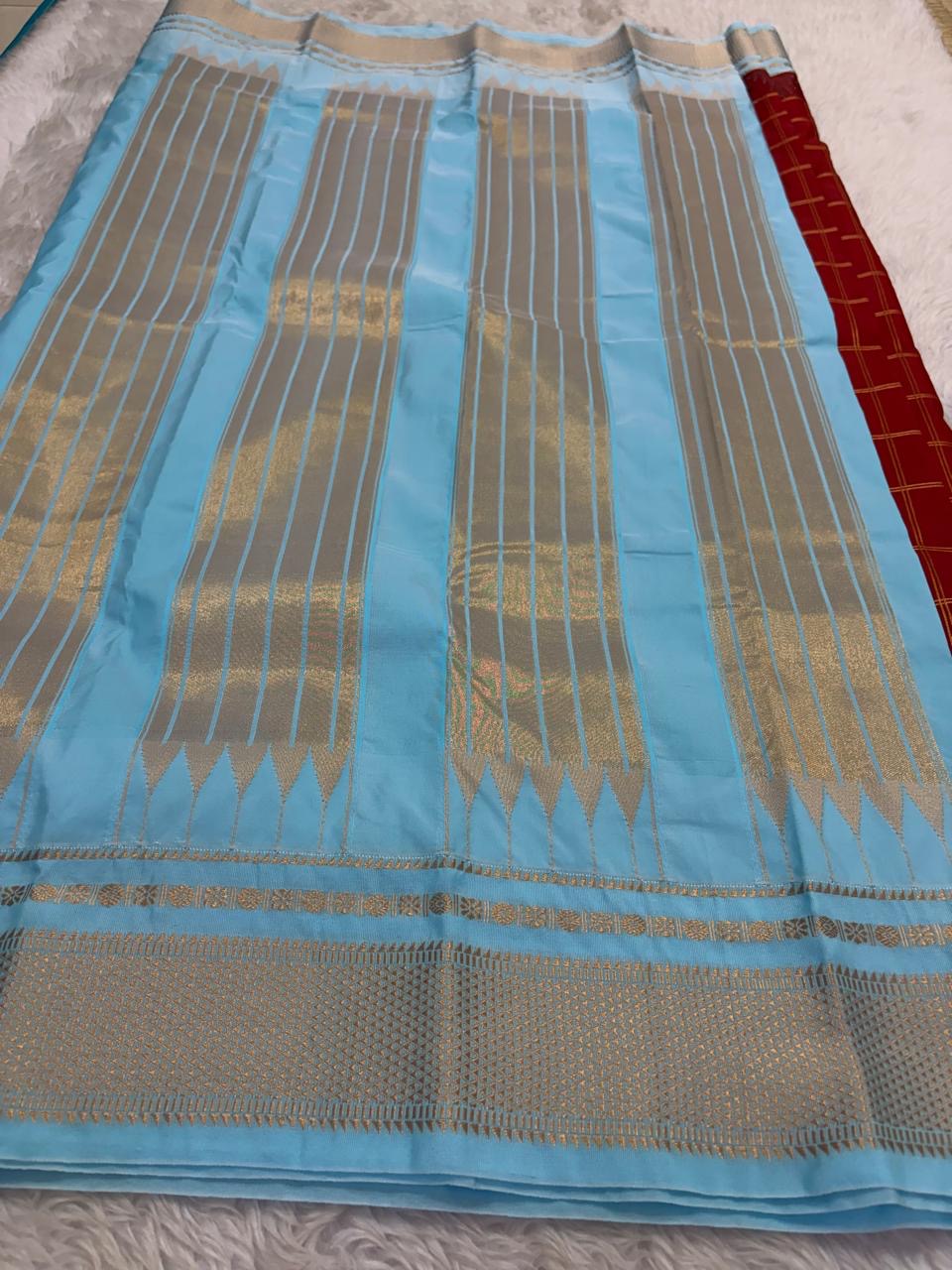 Deep red Kanchipuram silk saree body detail