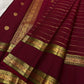 traditional tested zari detail on deep red Kanchipuram silk saree