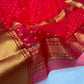 Deep red Chanderi saree showing gold butta detail