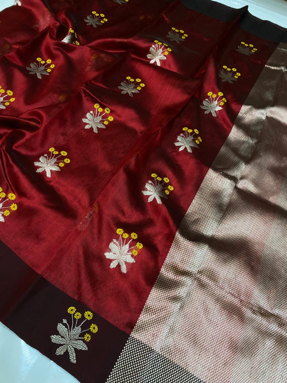 Deep red Chanderi saree with silver and yellow floral buttas